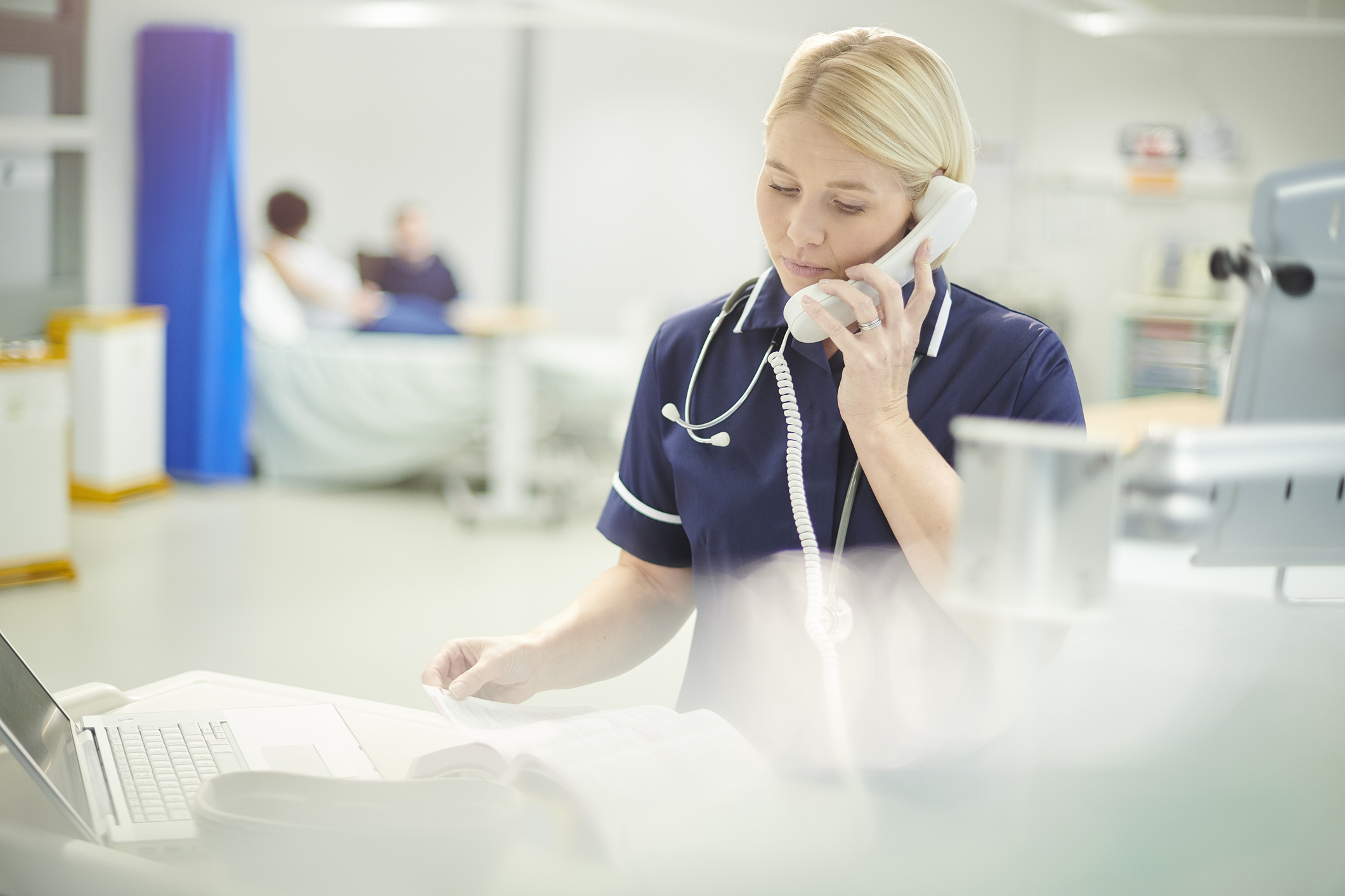 Nurse speaking on the telephone