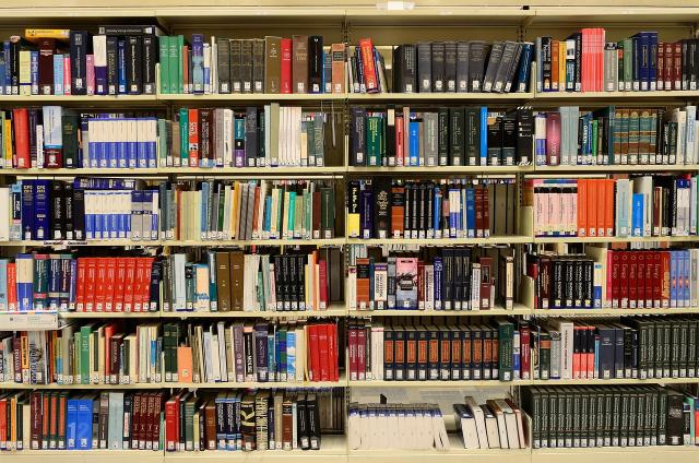 Library shelves with books